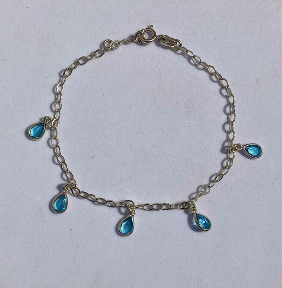 PU021A PULSEIRA DE PRATA FORMATO GOTAS DE ZIRCONIA AZUL